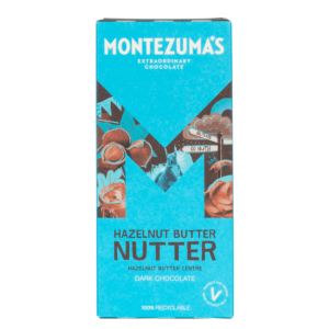 hazelnut butter nutter bar - blue box with hazelnuts in the Montezuma's 'm' logo 